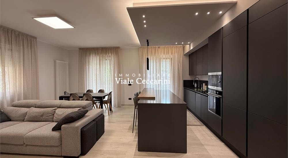 Soggiorno con cucina a vista