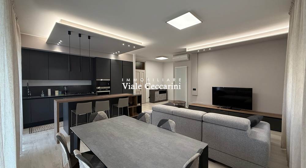 Soggiorno con cucina a vista