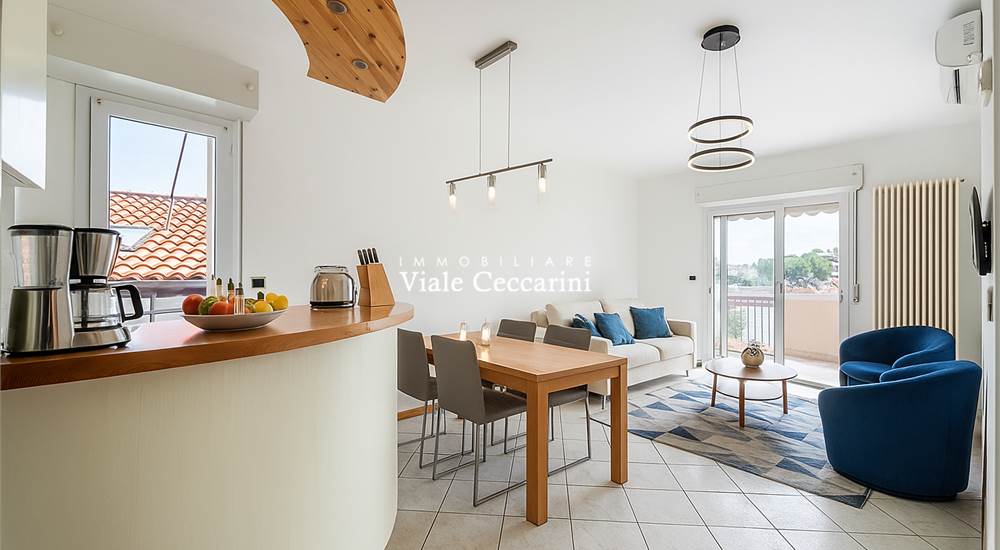 Zona giorno con ipotesi di arredi