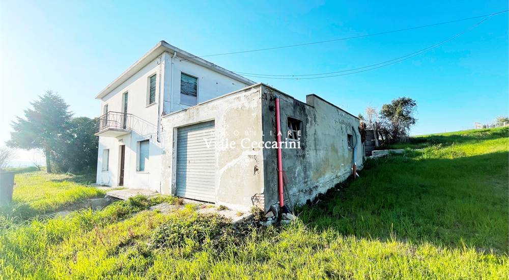 Casa con terreno di proprietà